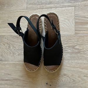 TOMS black wedge. Gently used. Size 7. Very comfy shoe.